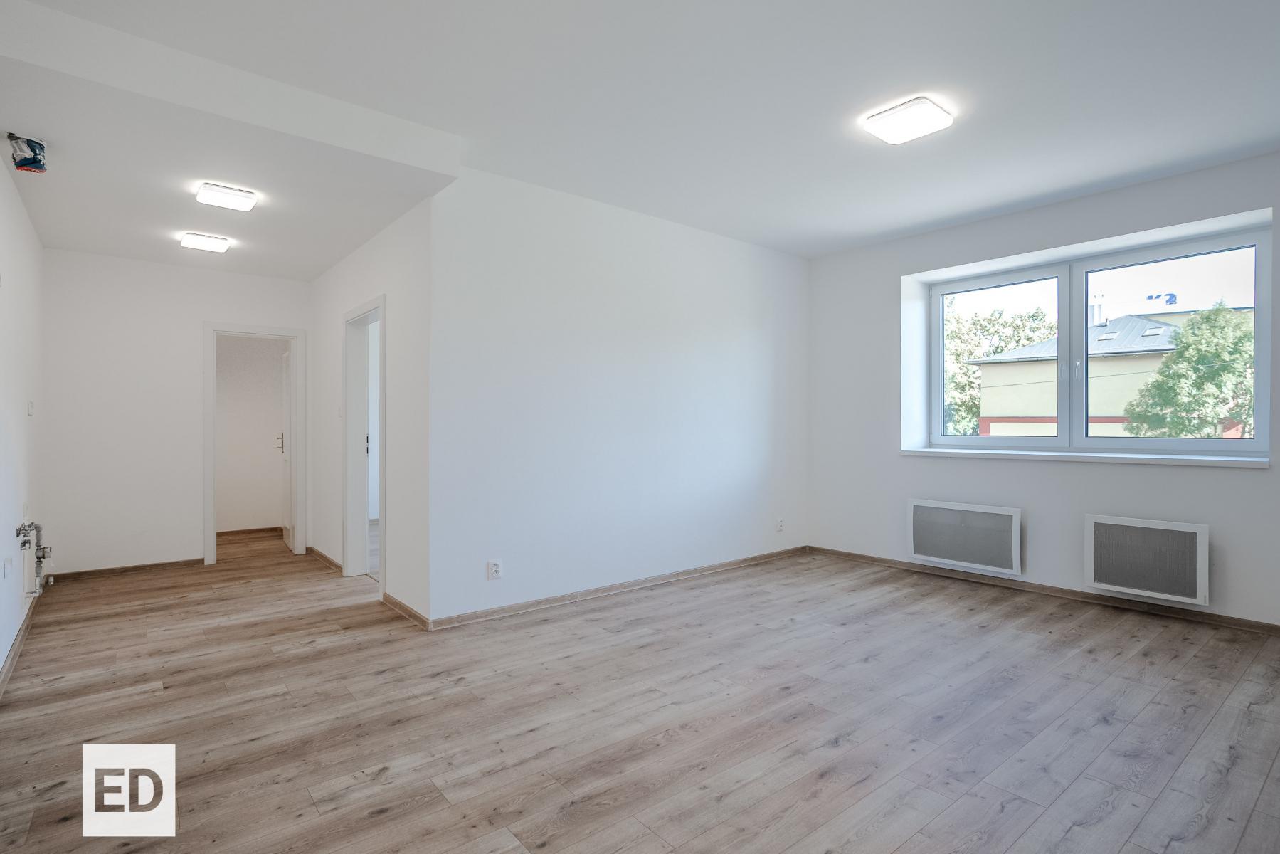 Obývací pokoj s přípravou na kuchyňskou linku
