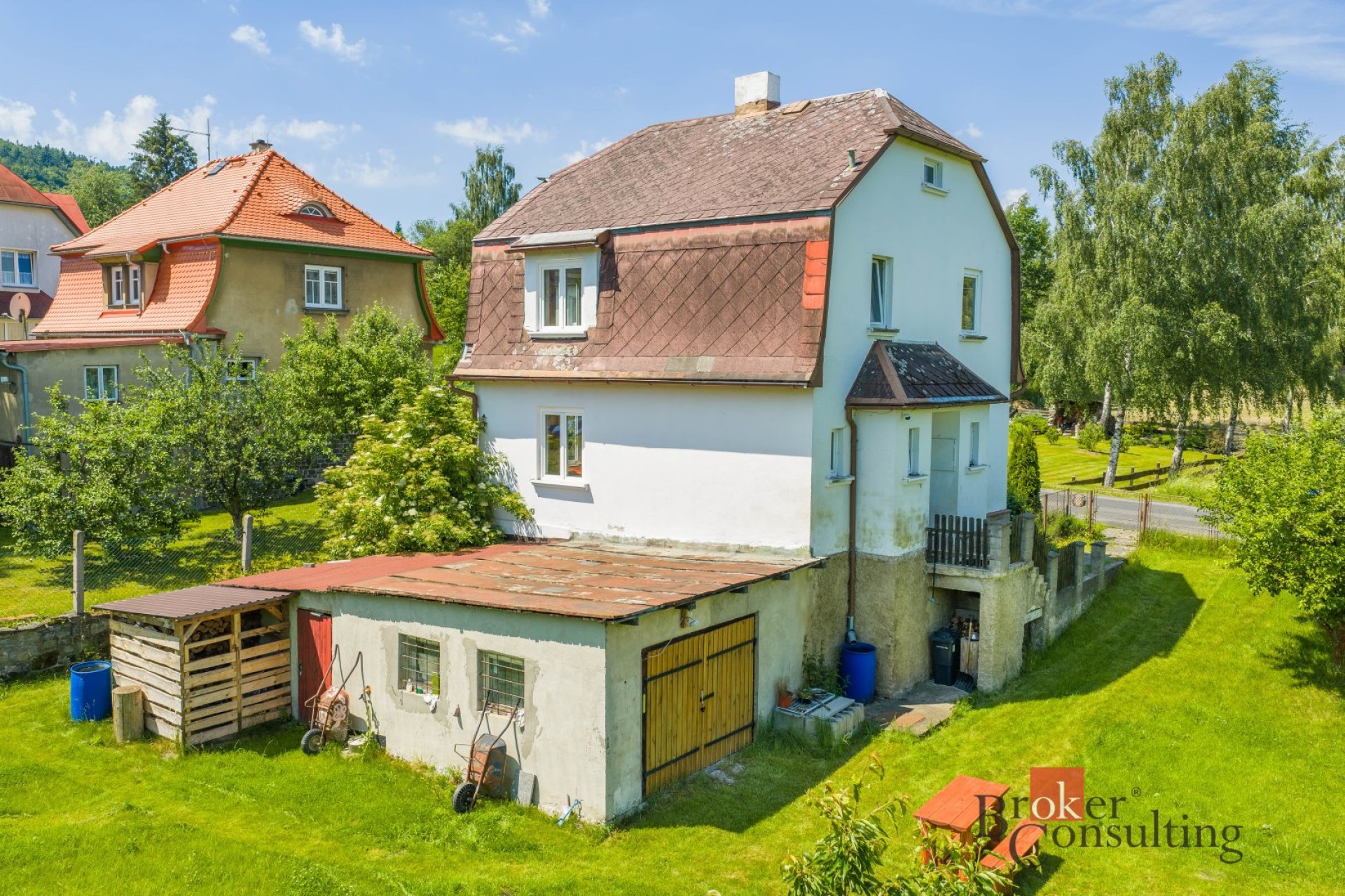 Prodej rodinného domu se zahradou a garáží – Jiřetín