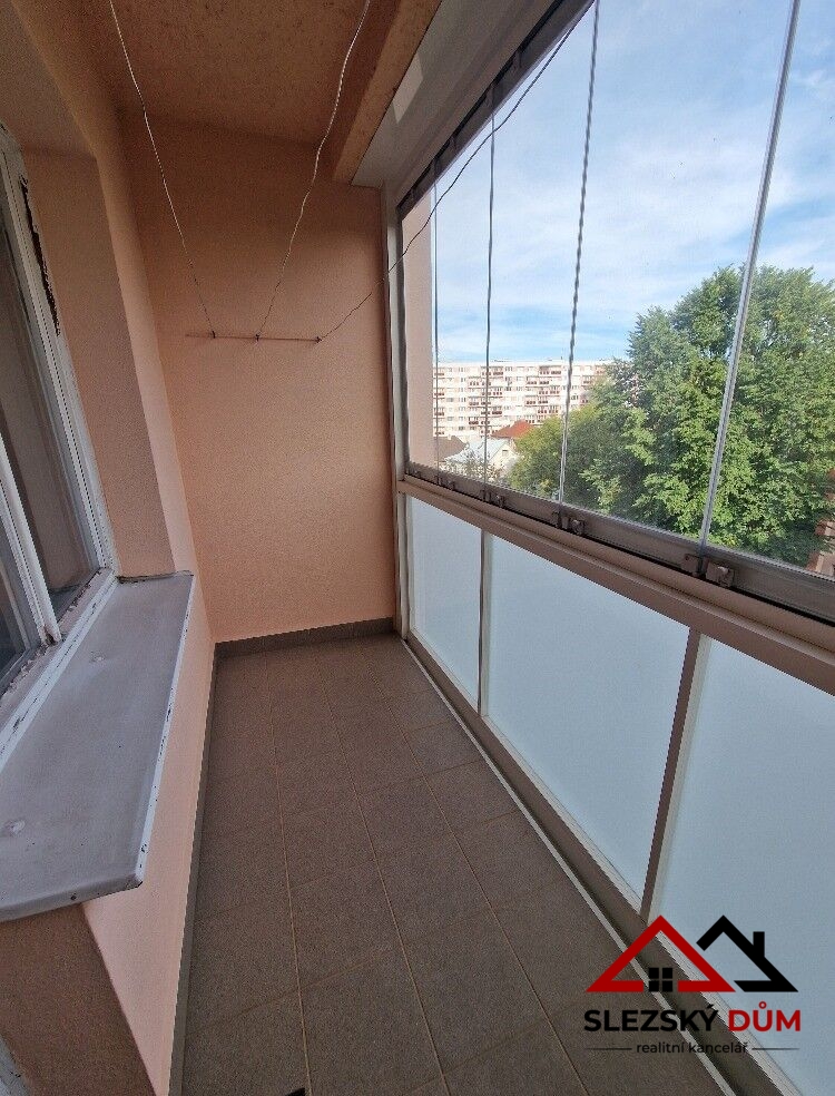 Tel.: 604 799 700 RK Slezský dům