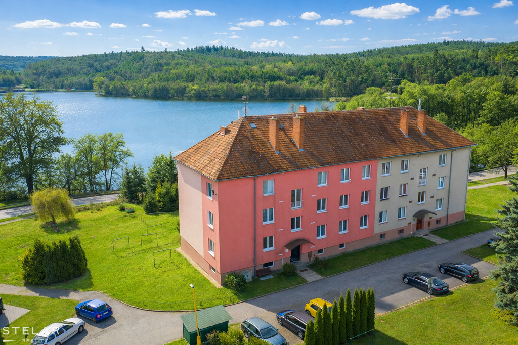 lakeside-apartment-with-vibrant-surroundings.png