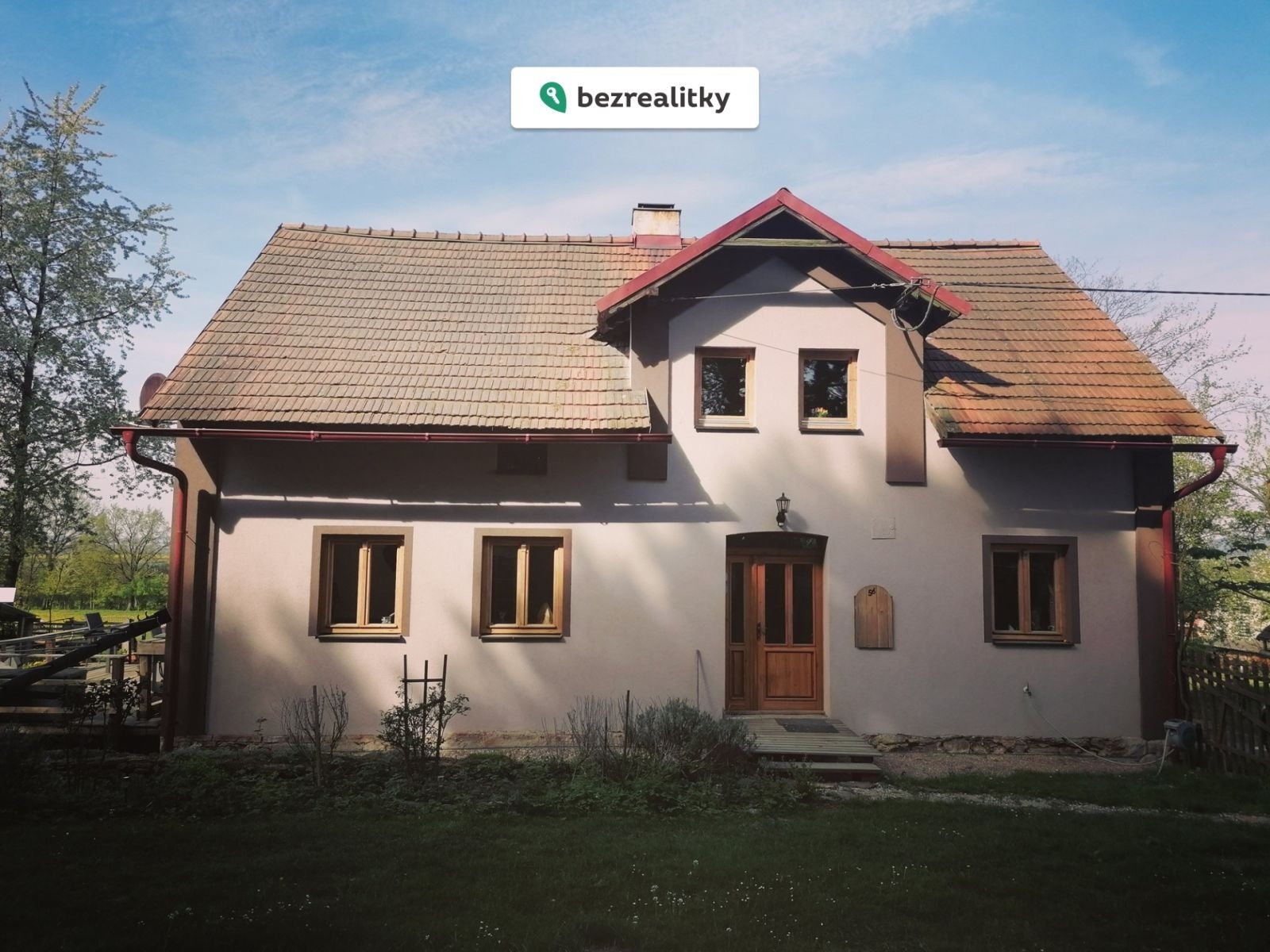 1779563758-gykqfwwznt-front-house