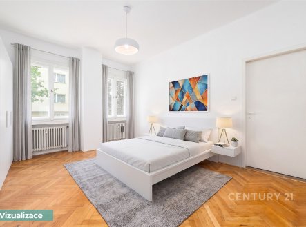 Prostorná ložnice s parketovou podlahou, velkými okny a moderním designem nabízí dostatek přirozeného světla a elegantní atmosféru. | Prodej bytu, 2+kk, 49 m²