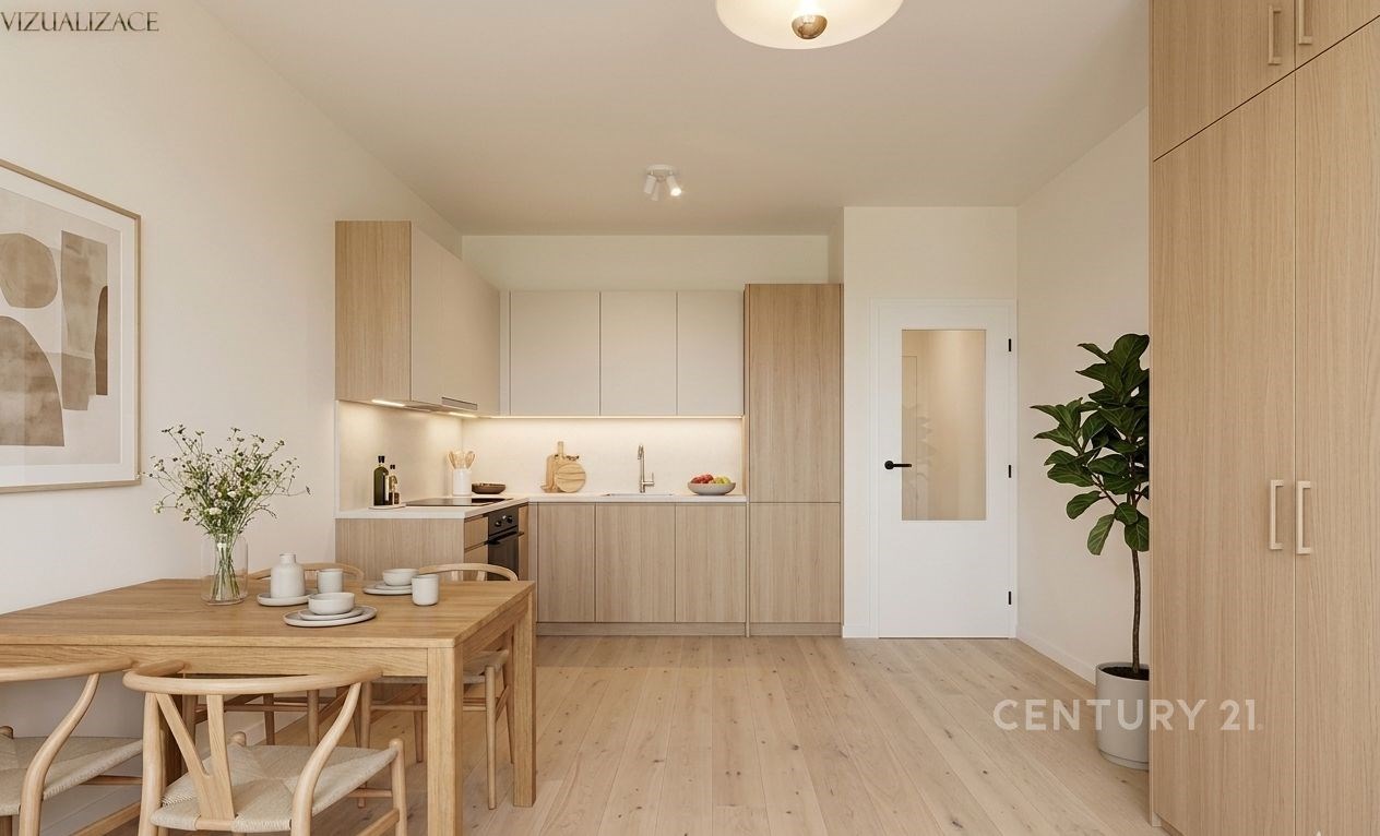 Kuchyňský kout s moderní dřevěnou linkou, parketová podlaha, světlý prostor s vestavěnými skříněmi a minimalistickým designem.