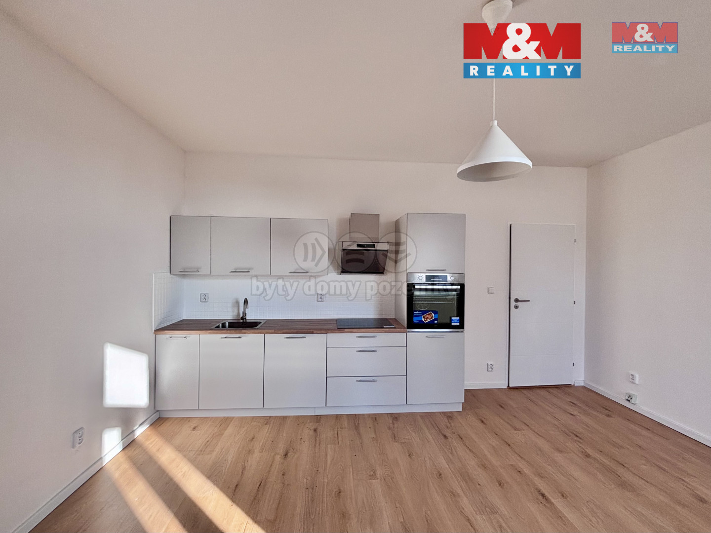 Obývací pokoj a kuchyň