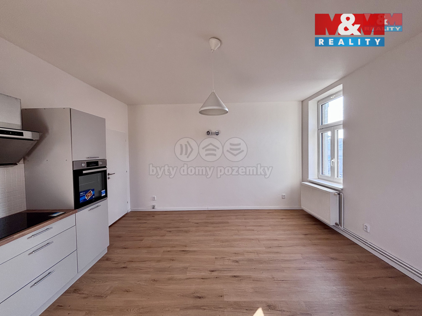 Obývací pokoj a kuchyň