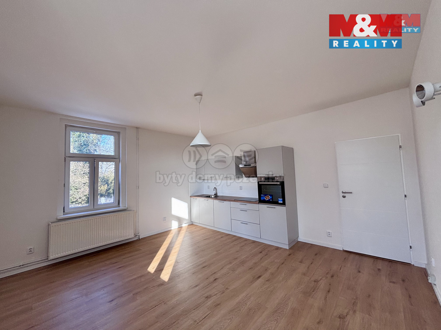 Obývací pokoj a kuchyň