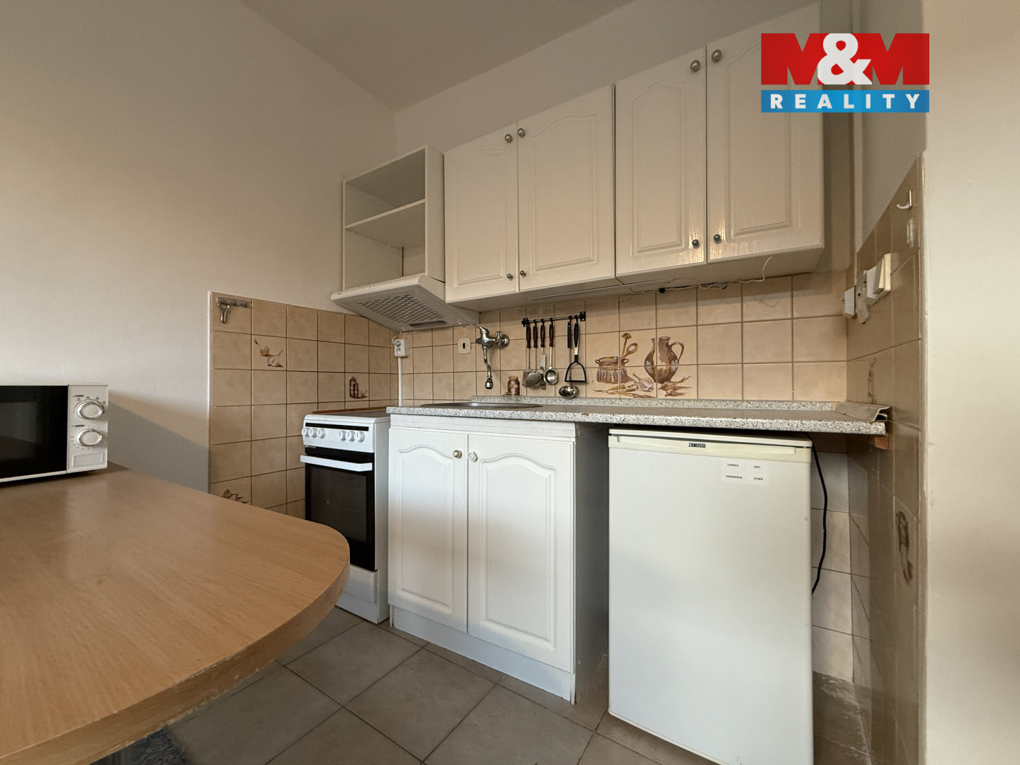 Pokoj s kuchyňským koutem