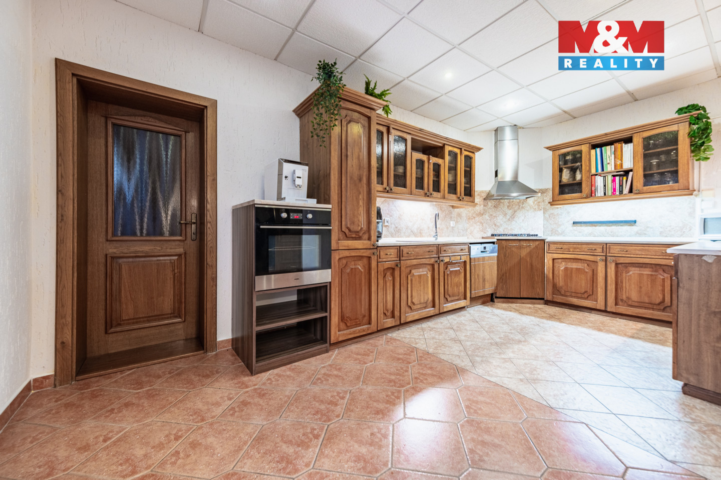 Kuchyně v bytě 3+1 v 1. NP