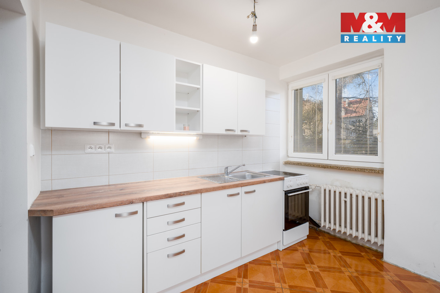 Pokoj s kuchyňským koutem