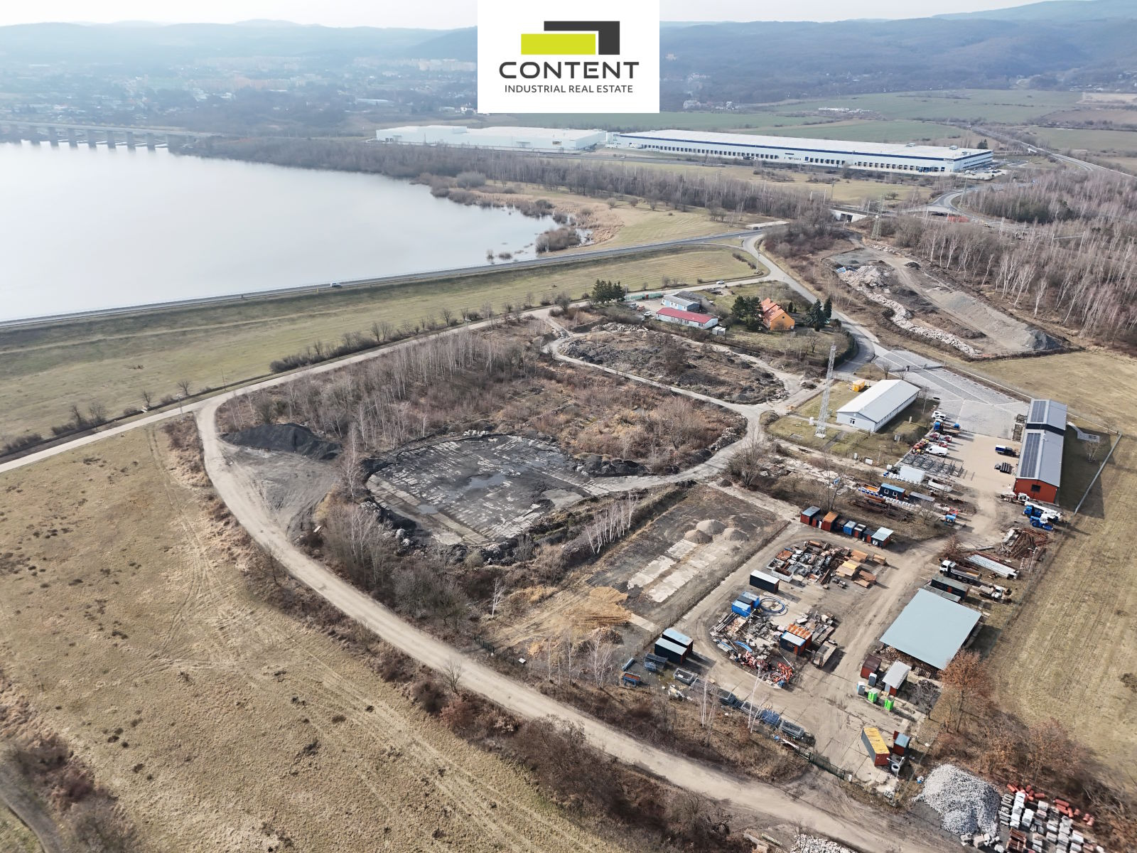 Prodej komerčního pozemku 27.899 m², Chomutov, D7