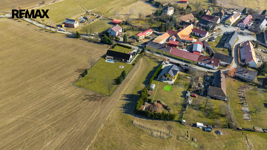 Pozemek s domem