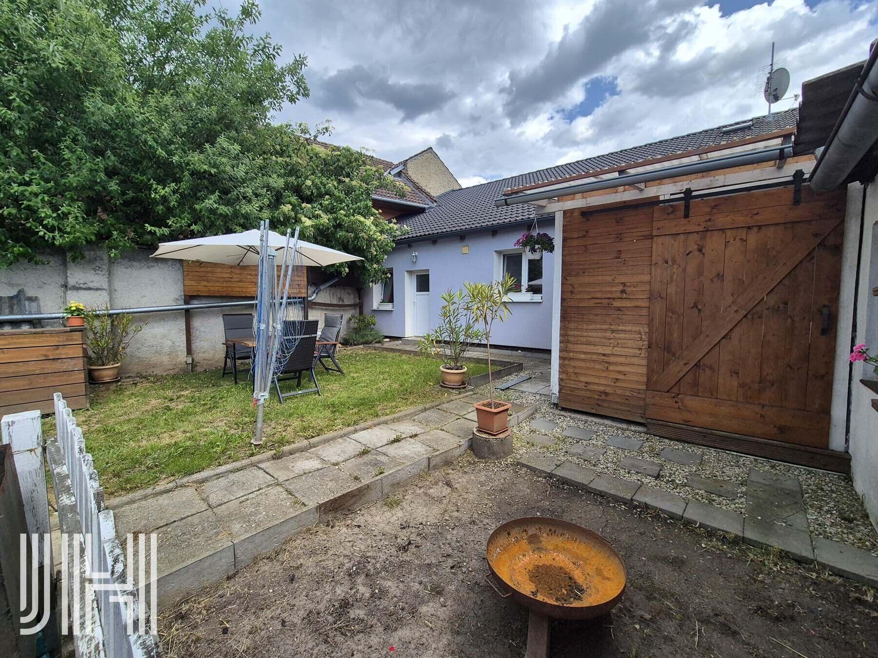 Prodej opraveného domu se zahradou s výbornou dostupností do města