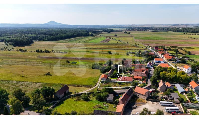 Prodej stavebního pozemku 1000 m2, Chodouny