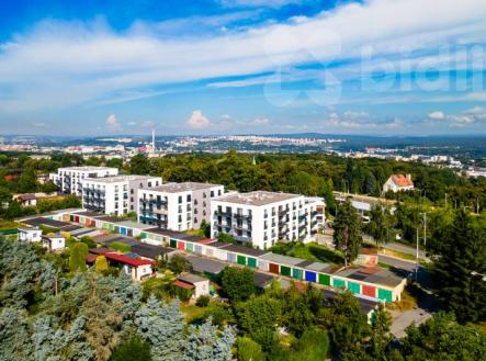 Prodej moderního družstevního bytu 3+kk (62 m2) s předzahrádkou, garážovým stáním a komorou