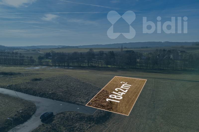 Pozemek se stavebním povolením na rodinný dům