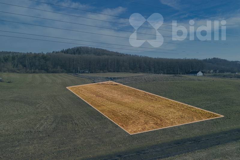 Pozemek se stavebním povolením na rodinný dům
