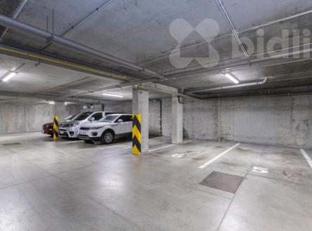 Prodej bytu 2+kk, 67m2, balkon, šatna, garážové stání, cihla