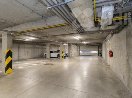 Prodej bytu 2+kk, 67m2, balkon, šatna, garážové stání, cihla