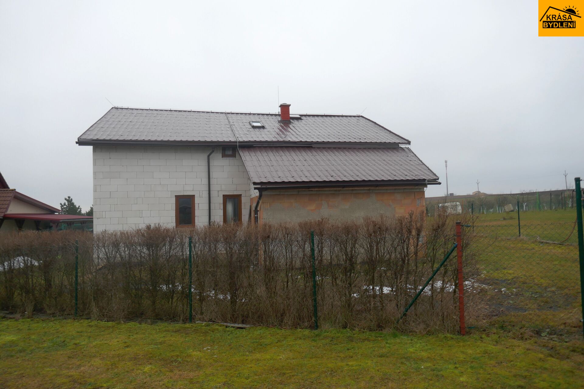 Prodej rodinného domu - hrubé stavby v Radotíně