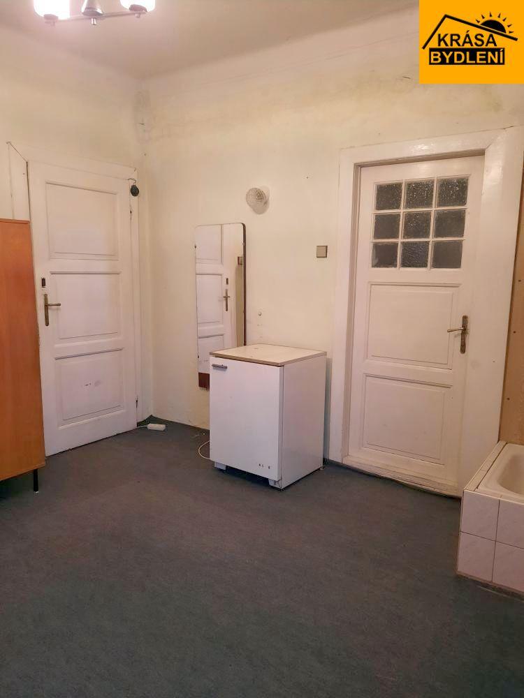 Prodej bytu 1+1 s parkovacím stáním v Olomouci, Chválkovice