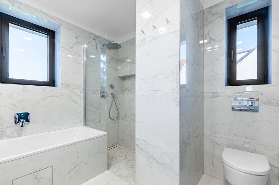 Prodej zrekonstruovaného domu 6+1 s terasou, Herbenova, Praha 10 - Hostivař