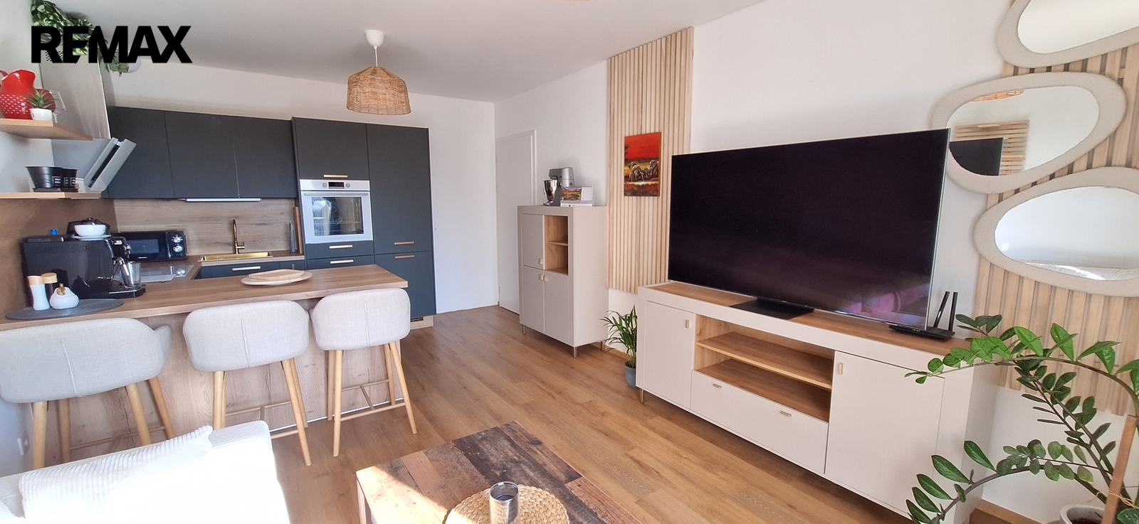 Obývací pokoj s kuchyňským koutem