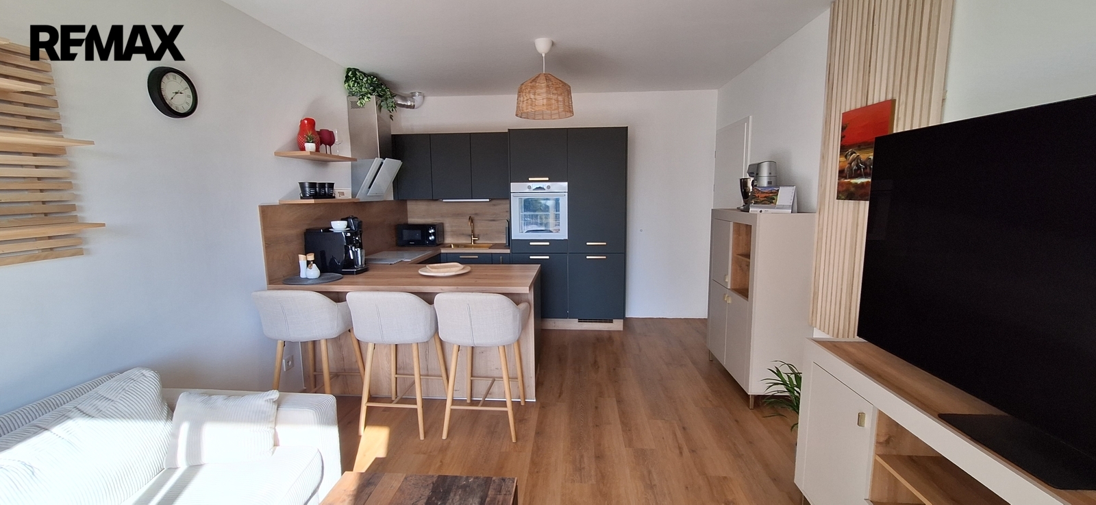 Obývací pokoj s kuchyňským koutem