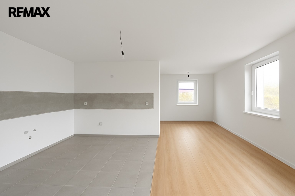 1NP - Obývací místnost + jídelnou a kuchyní