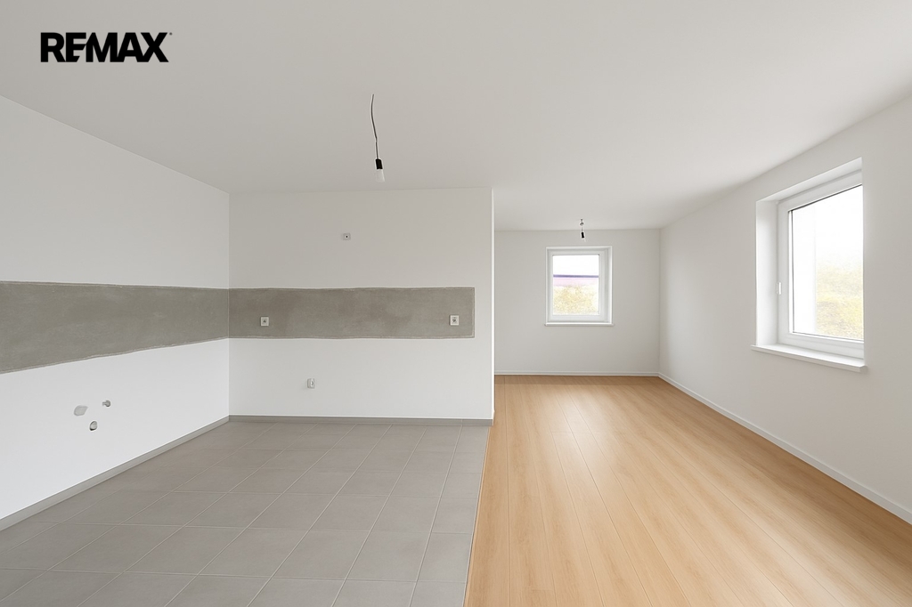 1NP - Obývací místnost + jídelnou a kuchyní