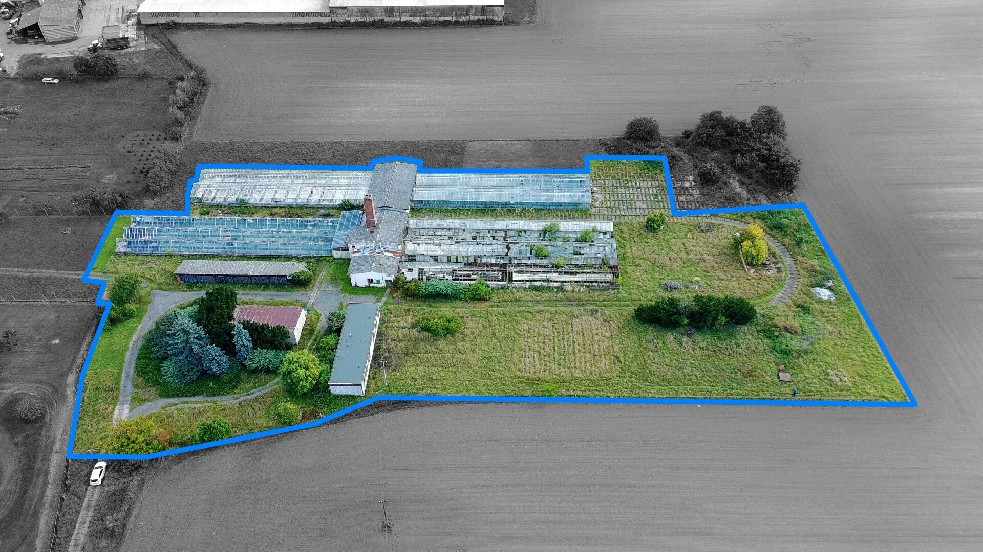 Bývalý zemědělský areál o výměře 11.704 m2 v Holicích