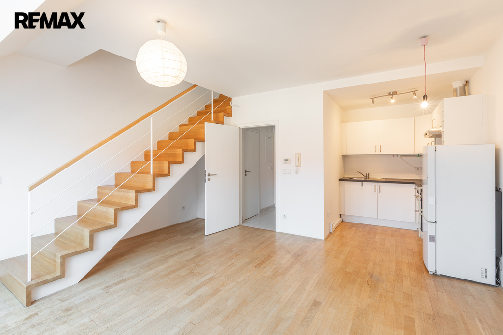 Obývací pokoj s kuchyňským koutem