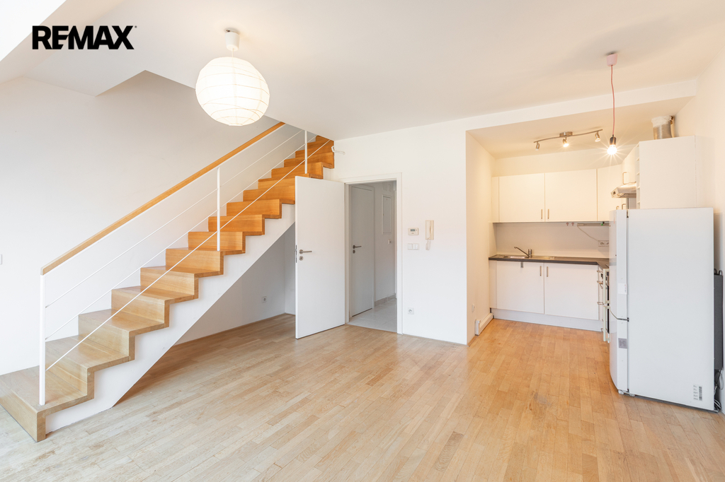 Obývací pokoj s kuchyňským koutem