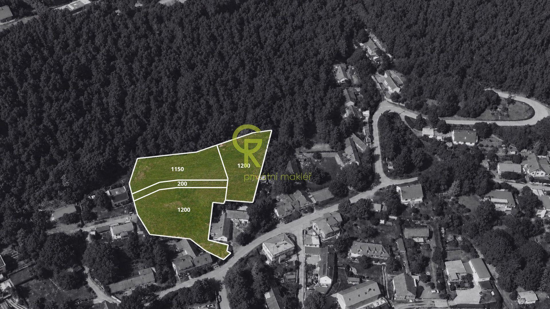 pozemek s možností rozdělení až na 3 stavební parcely u lesa a výhledem do údolí Vltavy- Řež u Prahy