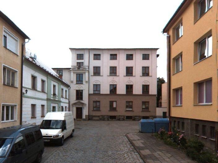 Soubor pozemků se stavbami, které spolu s oplocením tvoří uzavřený areál, Vidnava