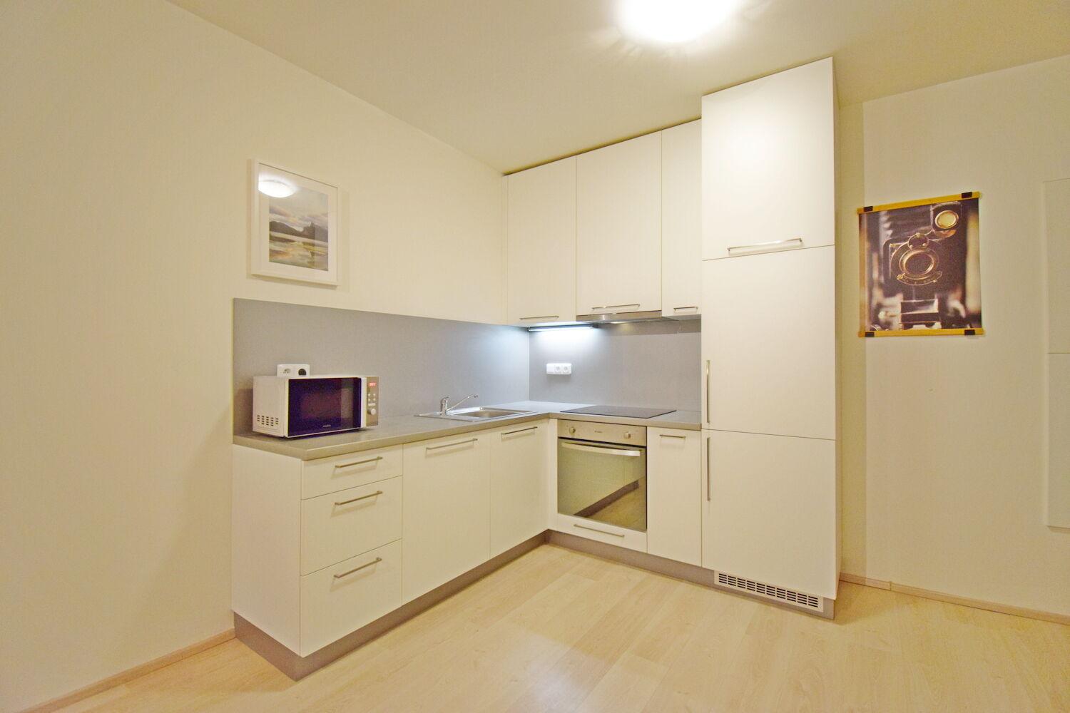 Moderní 2+kk s balkonem 59 m2 a garáží v novostavbě, Praha 10