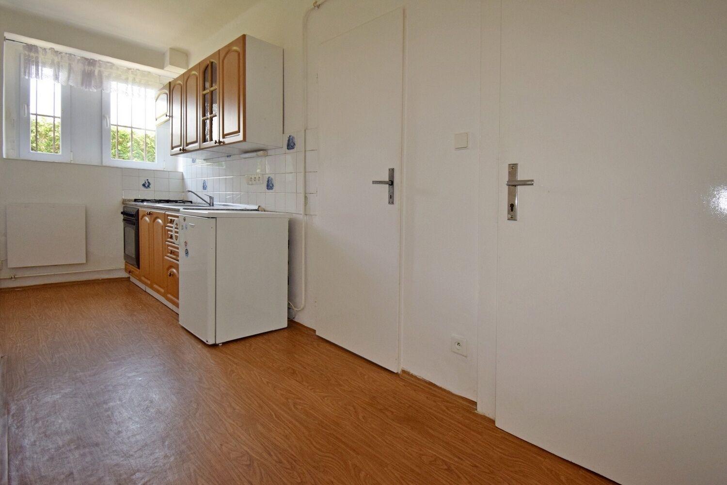 Částečně zařízený 1+1 v RD u metra Skalka, Praha 10