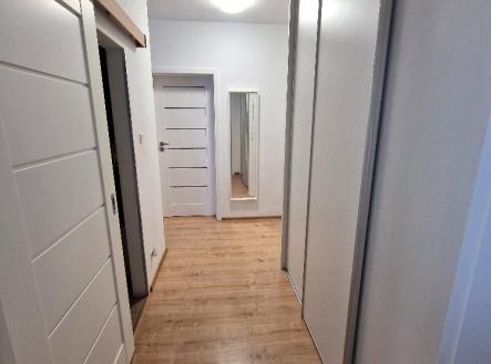Tel.:604 799 700 RK Slezský dům