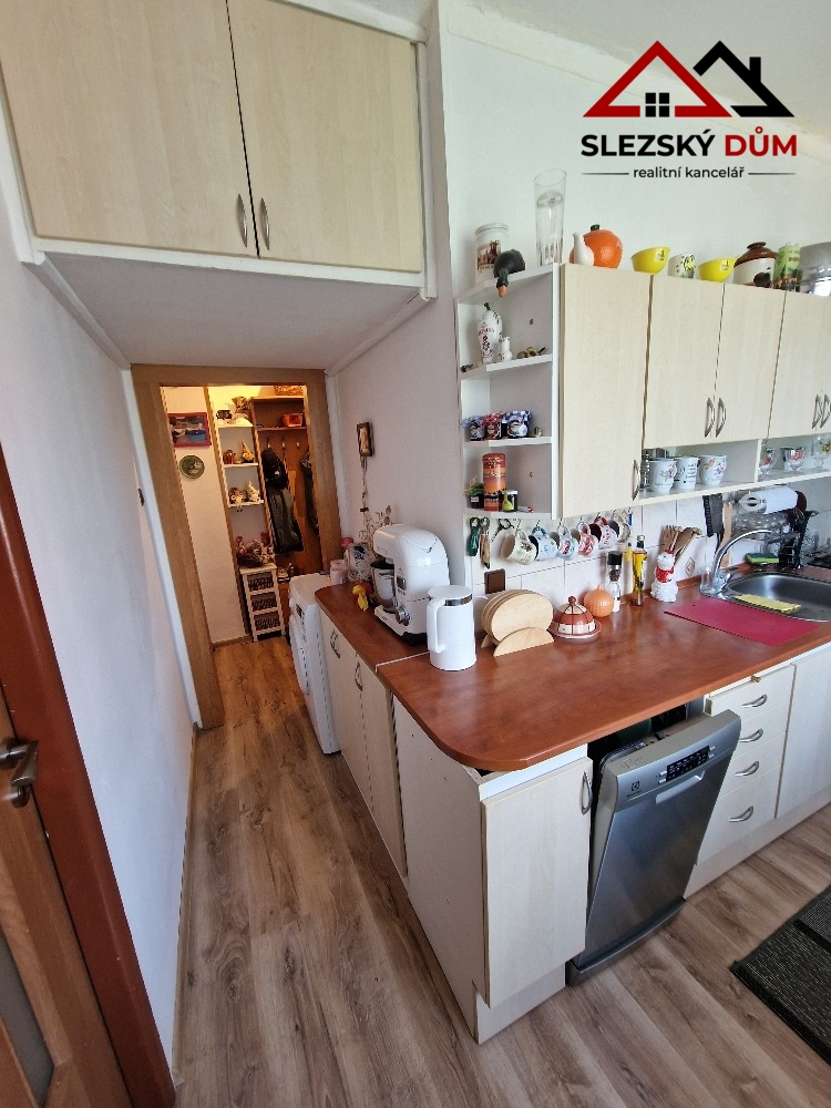 Tel.: 604 799 700 RK Slezský dům