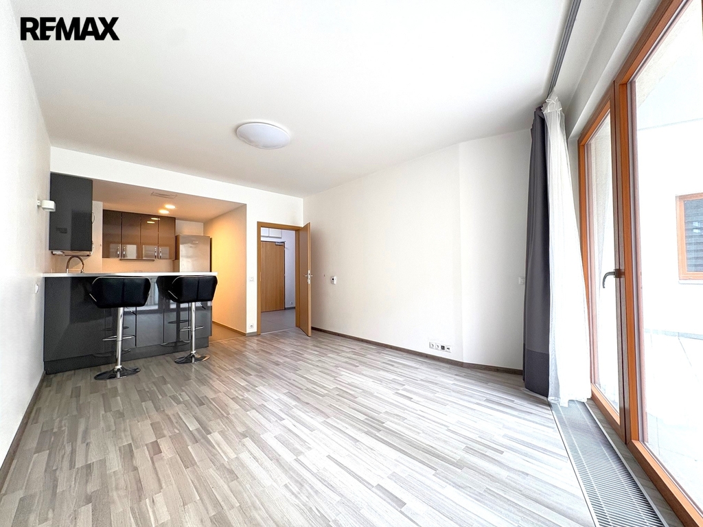 Obývací pokoj s kuchyňským koutem