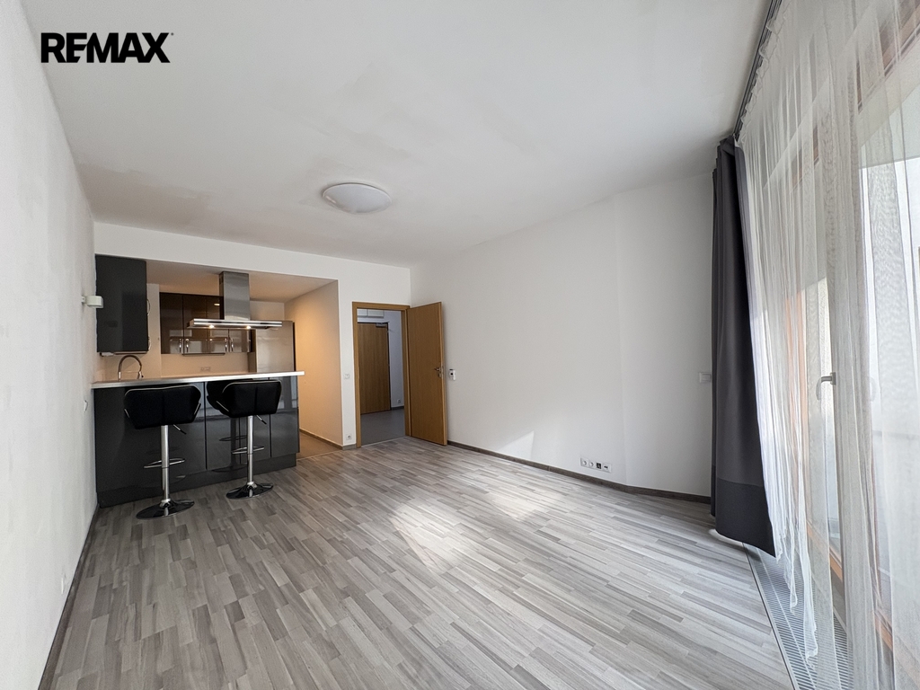 Obývací pokoj s kuchyňským koutem