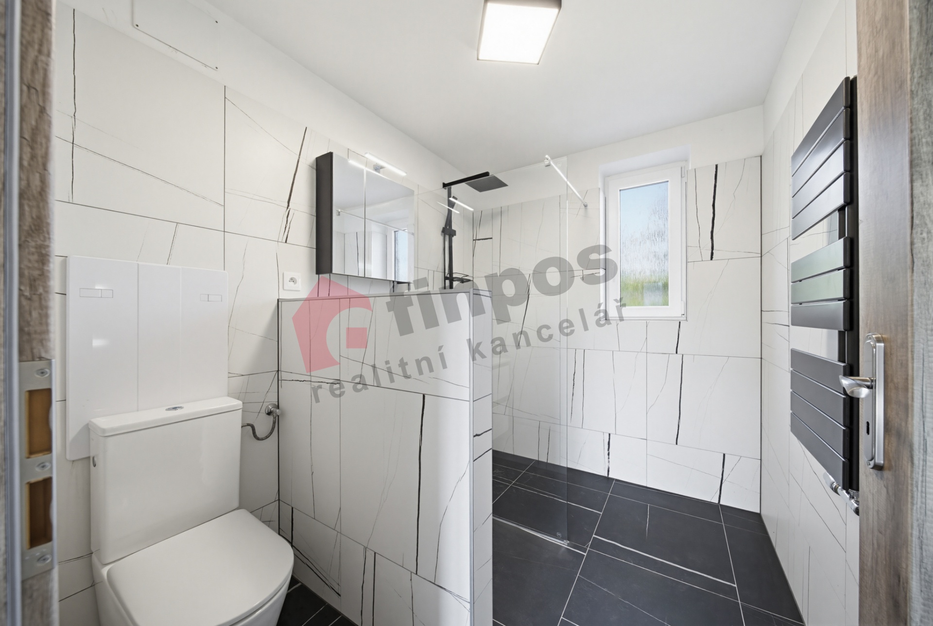 Prodej bytu 3+1 po kompletní rekonstrukci + 2x sklep + spoluvlastnictví na pozemku (vlastní zahrádka