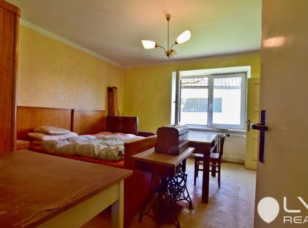 Ložnice s původním nábytkem