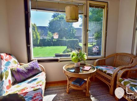 Zimní terasa s posezením dostupná z kuchyně