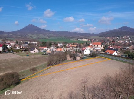 Prodej stavebního pozemku 1 085 m  Velemín, Výhled na Milešovku, Klid přírody s dostupností měst