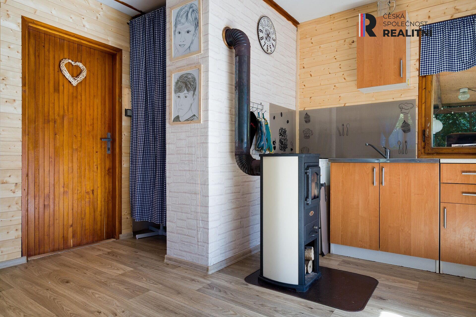 Prodej dřevostavby - chaty Vroutek - Mukoděly 317m2