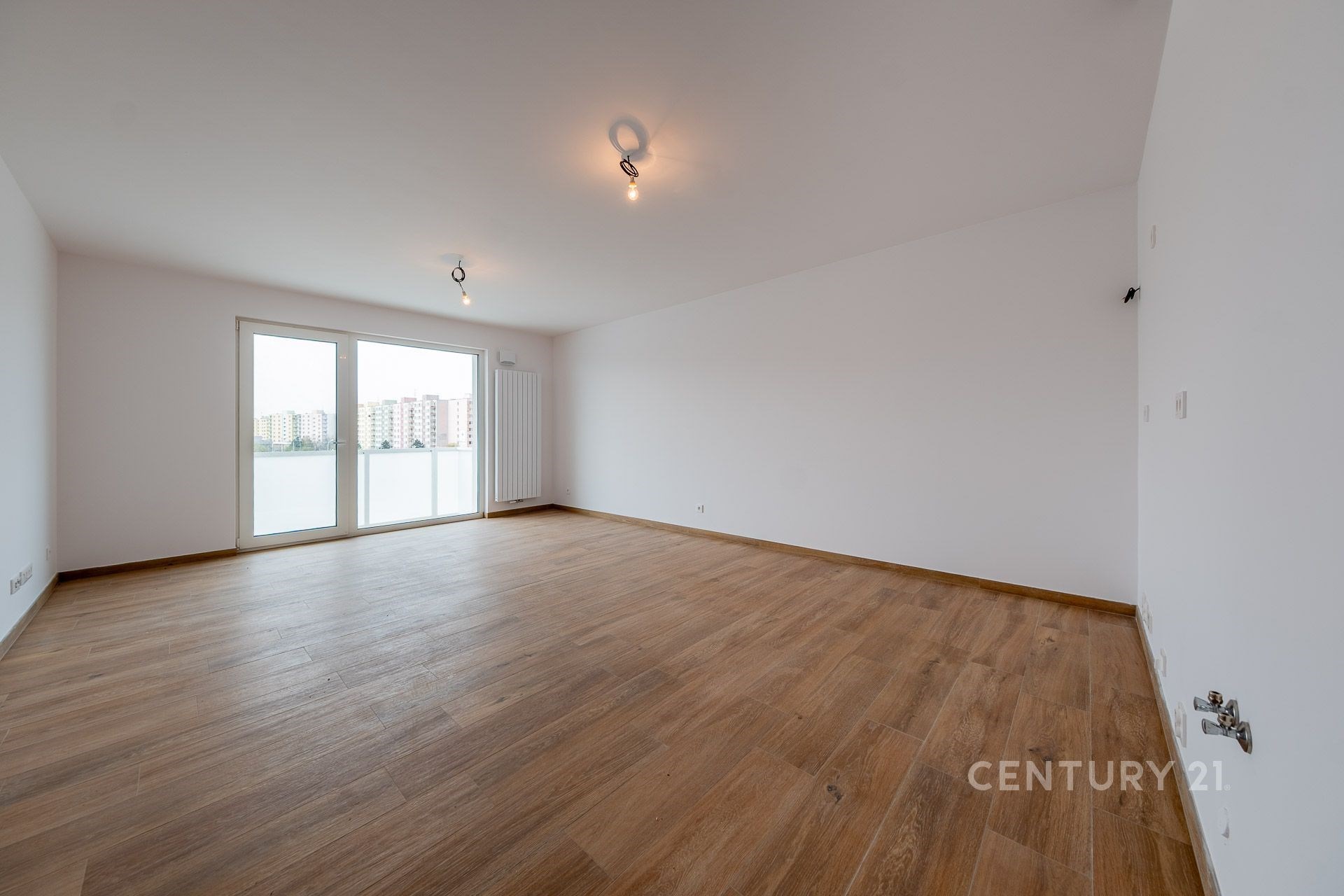 Obytný protor s  kuchyňským koutem