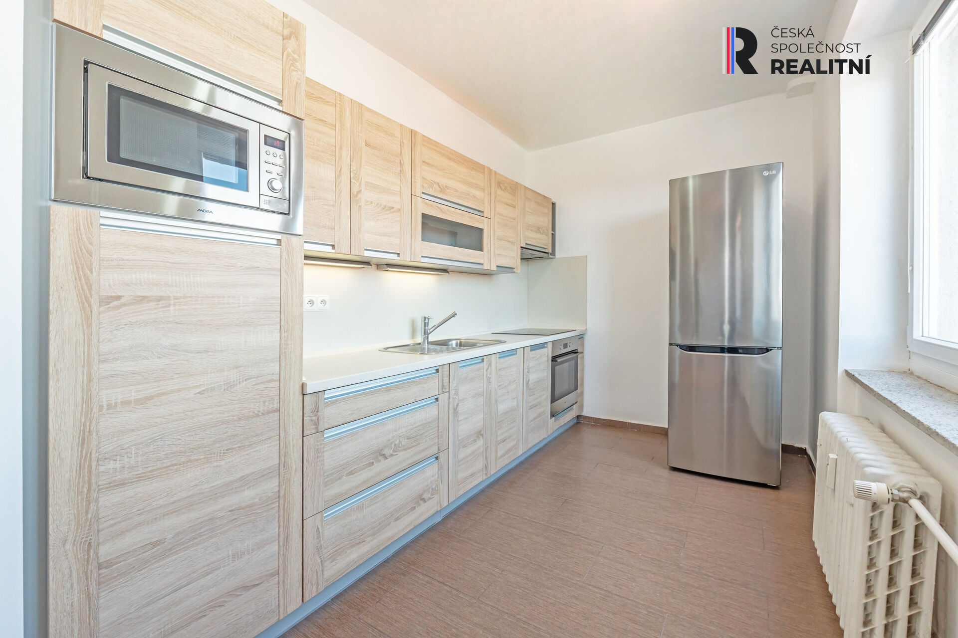 Prodej bytu 3+1 v 3.patře s balkonem a sklepem na ulici Bolzanova