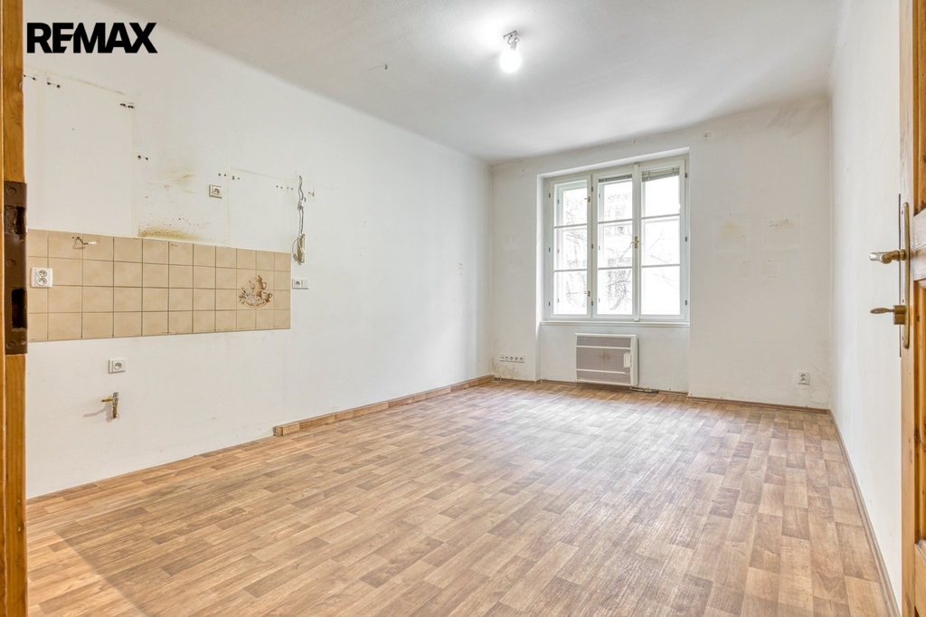 Obývací pokoj s kuchyňským koutem